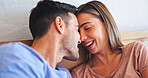 Happy, relax and with love on bed for romantic morning, conversation or marriage connection. Trust, people and cozy in bedroom with bonding together, relationship affection and forehead touch in home