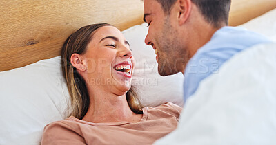 Buy stock photo Laughing, love and wake up with couple in bedroom of home for bonding, support and connection. Trust, romantic partner and happiness with man and woman in bed in house for wellness, joke and loyalty 