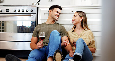 Buy stock photo Wine, kitchen and couple in new home with conversation, bonding or celebration together on weekend. Happy, alcohol drink and man with woman for relax with discussion, connection or anniversary.