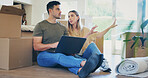 Couple, boxes and planning in new house with laptop, online shopping and research for interior design. Married people, discussion and moving in home with computer, ecommerce website and remodeling.