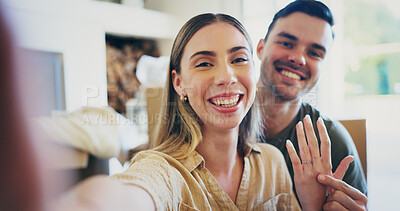 Buy stock photo Portrait, couple and selfie in home with engagement ring, bonding together or memory for relationship. Happy, people and photography for jewelry, celebration or proposal announcement on social media.