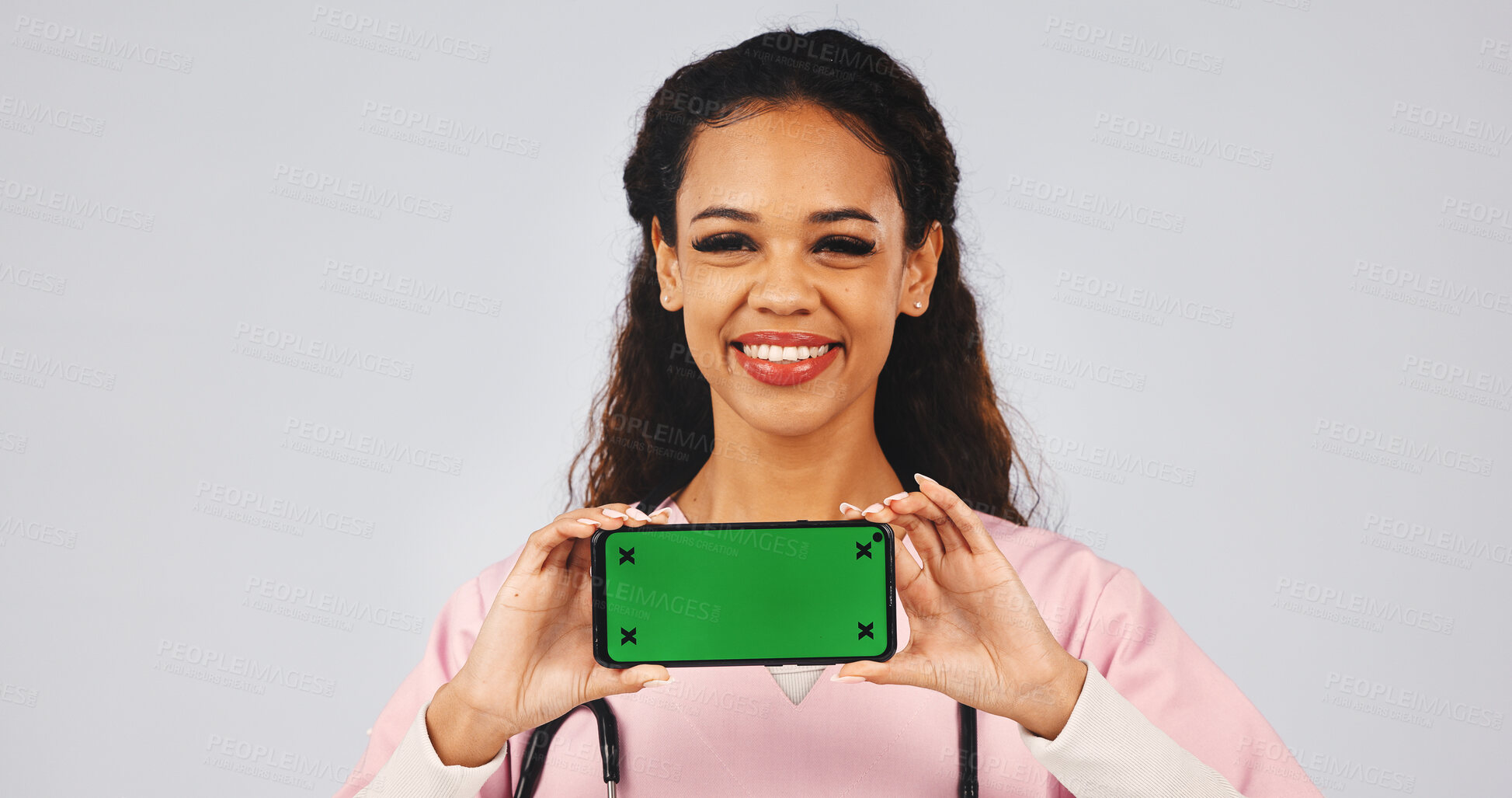 Buy stock photo Phone, happy and nurse in studio with green screen, medical info and announcement with space. Portrait, mockup and woman with cellphone for telehealth, website and healthcare news on white background