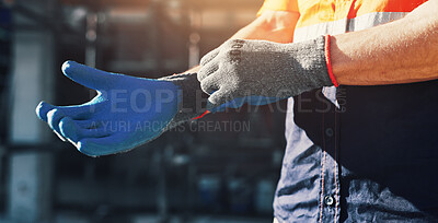 Buy stock photo Hand, architecture and man with gloves for safety, construction site or building renovation. Technician, person or employee with equipment for protection, engineer compliance or project maintenance