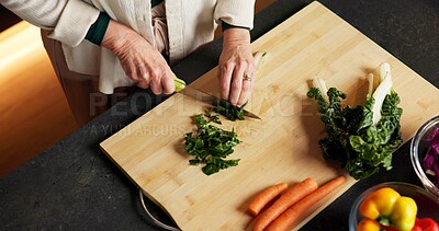Buy stock photo Hands, person and vegetables at house for cooking, meal prep and healthy food for vegan lunch. Above, mature chef and cutting in kitchen with organic ingredients, culinary skills and recipe for salad