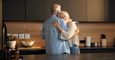 Buy stock photo Smile, hug and elderly couple in home for support, comfort or bonding together in kitchen. Love, commitment and old man with woman for connection with marriage, anniversary and embrace in apartment