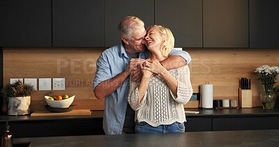 Buy stock photo Laugh, hug and senior couple in home for support, comfort or bonding together in kitchen. Love, commitment and elderly man with woman for marriage, anniversary and funny joke or embrace in apartment