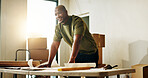 Man, thinking and renovation with blueprint for home improvement, property upgrade or interior design. Black person, smile and layout document in house with vision, floor plan and remodeling project.