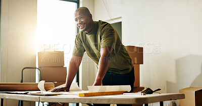 Buy stock photo Man, thinking and renovation with blueprint for home improvement, property upgrade or interior design. Black person, smile and layout document in house with vision, floor plan and remodeling project.