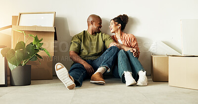 Buy stock photo Couple, relax and moving in new home with boxes, property investment and happy for mortgage loan. Married, African people smile and bonding together in dream house with package, real estate and love.