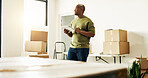 Interior design, tablet and thinking with black man in new house for diy project or renovation. App, inspiration and planning with happy homeowner in apartment for development or home improvement