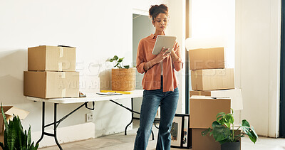 Buy stock photo Woman, thinking and moving in new house with tablet, research interior design trends and renovation. Person, browsing and planning in home with digital tech, remodeling project or property investment