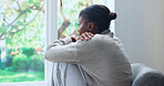 Black woman, stress and window in living room for fear, overthinking or loss with pressure or phobia. Trauma, panic or female person with depression in home with anxiety for mental health crisis