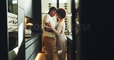 Buy stock photo Couple, love and hug in kitchen with connection, bonding together and relax on weekend break in home. Space, married black people and embrace in house with relationship commitment, loyalty and care.