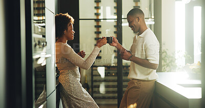 Buy stock photo Happy, couple and cheers in kitchen with coffee, bonding together and love for relationship commitment. Married, black people and toast in home with warm drink, care and connection on weekend break.
