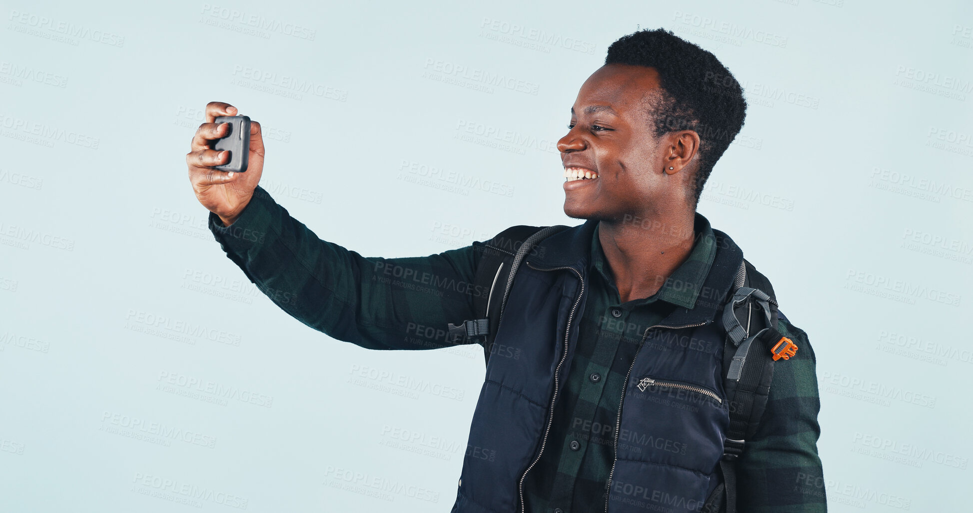 Buy stock photo Selfie, hiking and black man in studio for travel, holiday or adventure on weekend trip with memory. Happy, backpacking and person with photography picture for trekking by white background with space