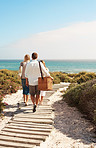 Walking towards the sand and sea