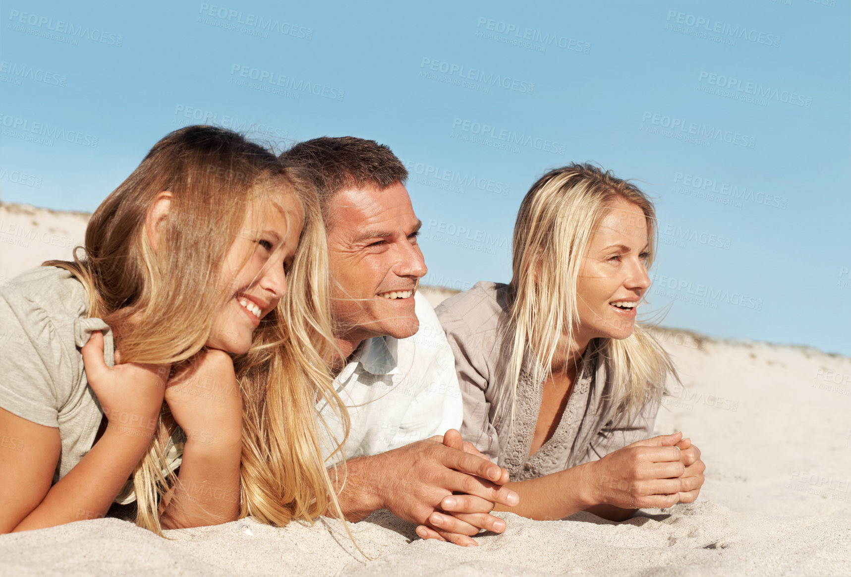 Buy stock photo Thinking, relax and sand with family at beach for love, adventure and bonding together on holiday. Smile, parents and rest at seaside with daughter, connection and sightseeing view on summer vacation