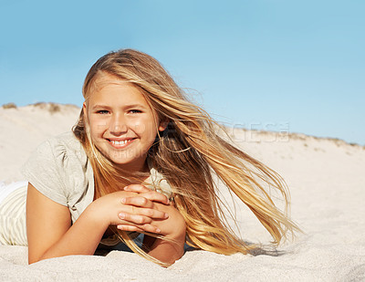 Buy stock photo Portrait, relax and child at beach with smile, adventure and positive attitude on holiday. Happy, kid and mockup space at seashore with happiness, calm morning and weekend break on sand for vacation