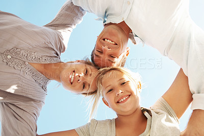 Buy stock photo Portrait, family and huddle with hug outdoor for travel, adventure and bonding on holiday. Low angle, people and embrace daughter in nature with love, parental affection and connection on vacation