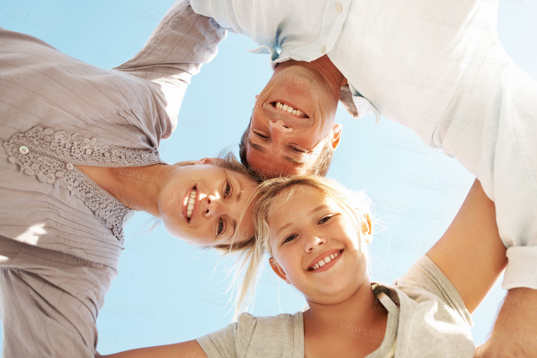 Buy stock photo Portrait, family and huddle with hug outdoor for travel, adventure and bonding on holiday. Low angle, people and embrace daughter in nature with love, parental affection and connection on vacation