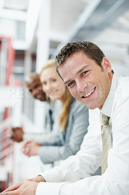 Buy stock photo Portrait, business and man in office for teamwork, human resources and recruitment planning. Corporate, happiness and people with employees for collaboration, onboarding and meeting for stock market