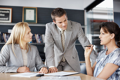 Buy stock photo Discussion, paperwork and business people in office for finance review, planning and investment. Corporate, team and workers with documents for financial report, funding proposal and budget growth