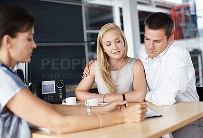 Buy stock photo Woman, help or couple in consultation with documents for finance advice, loan options or planning. Listen, people or financial advisor in office meeting for insurance policy, cover details or explain