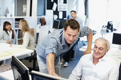 Buy stock photo Business, people and helping in office with computer, research and advice for finance training. Men, team and coworking in workplace with pc, financial coaching and assistance for investment proposal