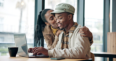Buy stock photo Kiss, laptop and remote work with black couple in coffee shop together for planning or research. Affection, computer and typing with happy people in restaurant for freelance or hybrid career