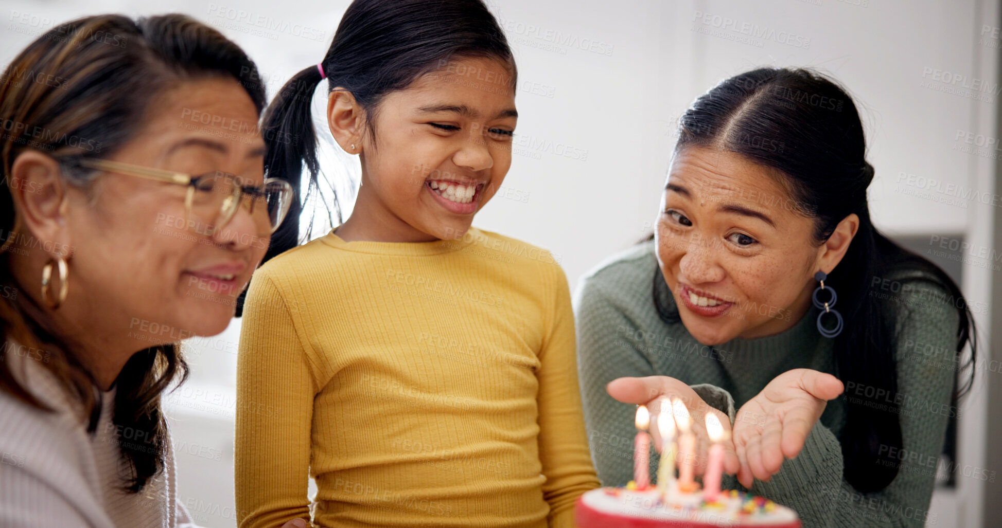 Buy stock photo Child, family and celebration with birthday cake in home, smile and special day with generations. Mother, grandmother and girl with candles at party, dessert or milestone with happiness in house