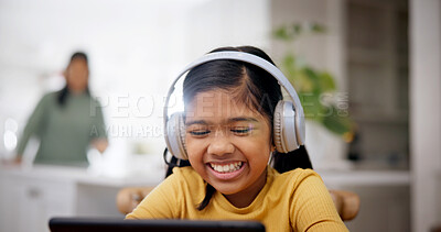 Buy stock photo Headphones, reading and child with tablet in home, online education and watch live stream of class. Laugh, elearning and happy girl with tech for academic development, funny video and joke for lesson