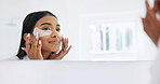 Woman, skincare and eye mask in bathroom with mirror, reduce dark circles or self care in morning. Space, happy person and apply collagen patch in home with reflection, beauty cosmetics and wellness.