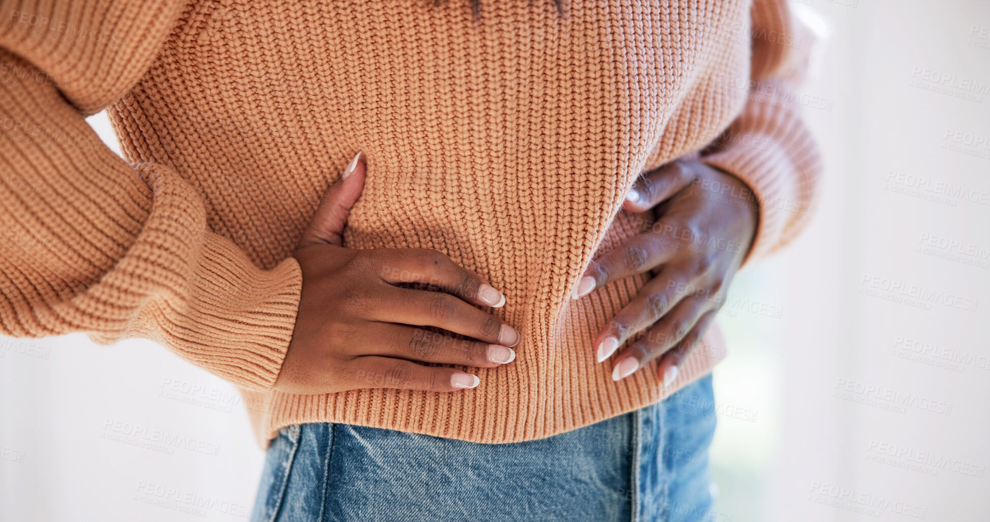 Buy stock photo Hands, pain and woman at house with stomach, discomfort and symptoms of menstruation. Sore, female person and cramps in home with abdomen ache, constipation and inflammation for chronic endometriosis