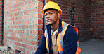 Construction site, thinking and black man with idea, engineering and reflection for quality control. Safety, risk assessment and person with maintenance, compliance and property for development
