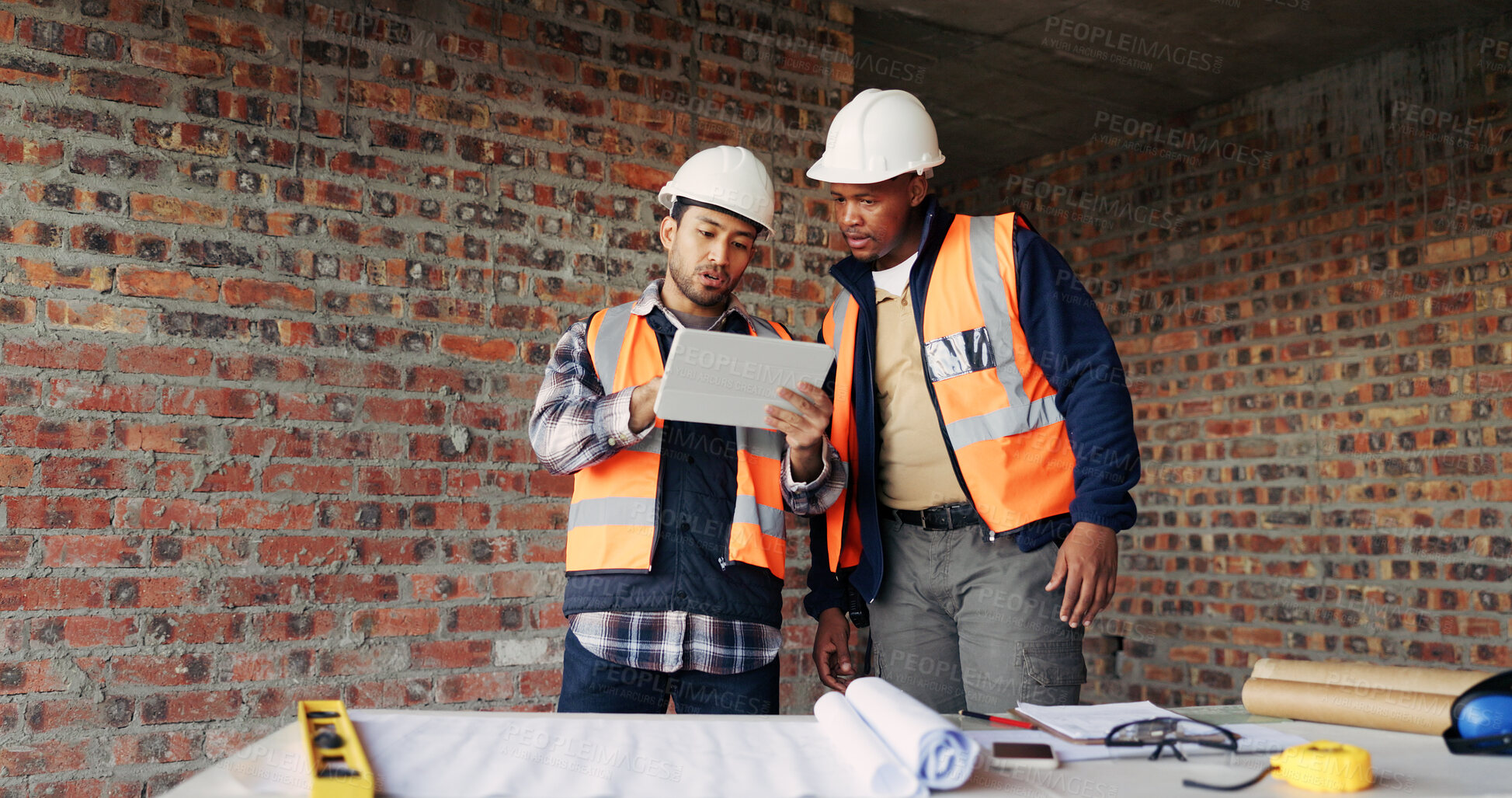 Buy stock photo Architect, meeting and people at construction site with tablet, design review and project collaboration. Men, discussion and architecture research with tech, planning and teamwork for infrastructure.