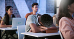 Tired, student and sleeping in classroom with tablet, education and night for academic exams. Fatigue, man and asleep in study hall with digital, learning lecture and overtime from college assessment