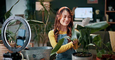 Buy stock photo Gardening, influencer and woman in home with ring light, phone and recording video for plant growth. Happy person, live stream and content creation with horticulture advice, tutorial or social media.