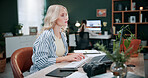 Creative, woman and typing in office with laptop, review project and research for digital marketing. Female person, tech and coworking in agency with feedback, proposal and advertising campaign