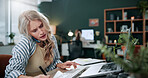 Woman, writing and phone call in office with laptop, planning and reminder for marketing schedule. Person, tech and contact in creative agency with diary notes, feedback or networking for advertising