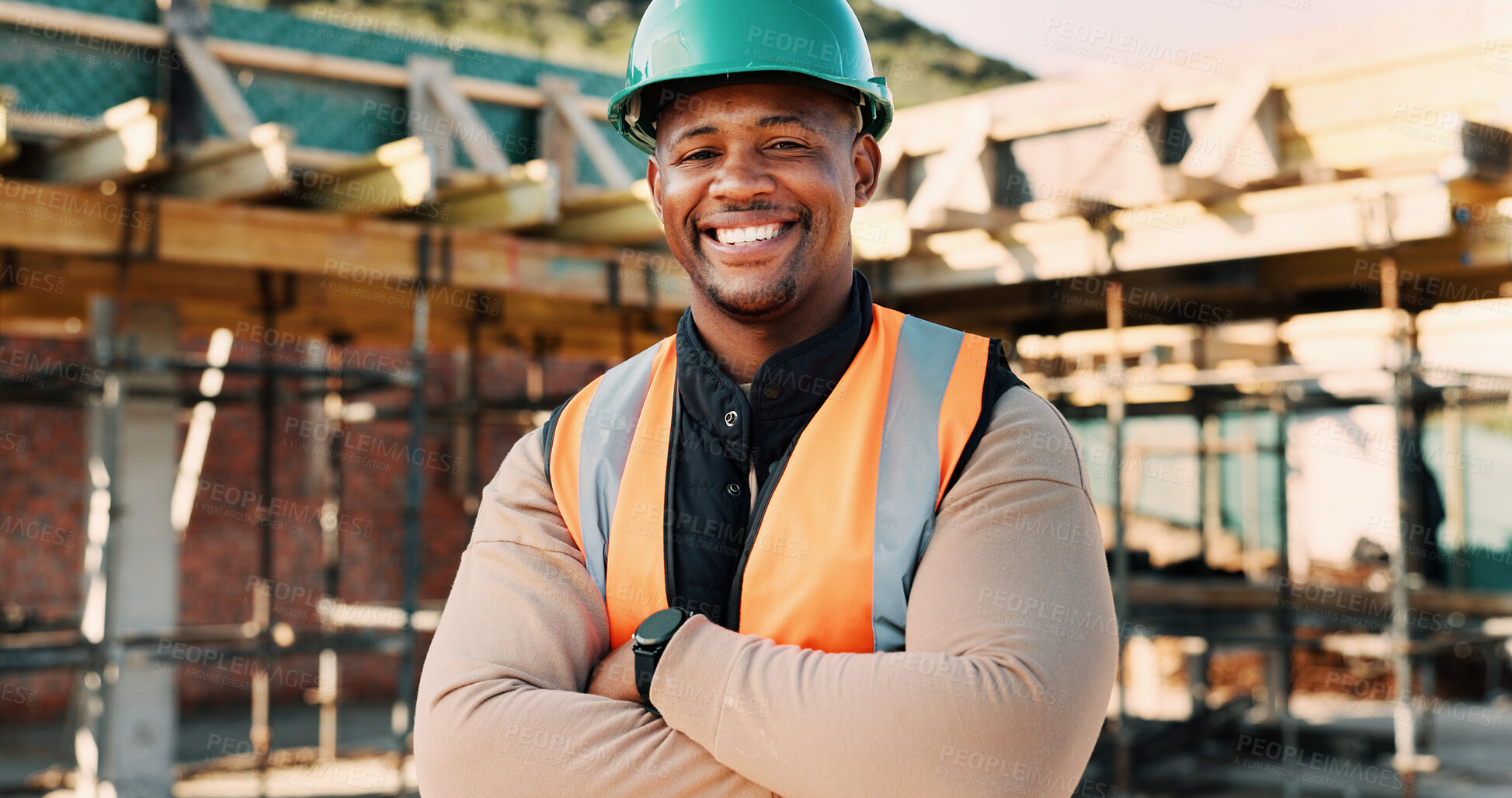 Buy stock photo Crossed arms, helmet and portrait of African man on construction site for infrastructure career. Architecture, contractor and happy person with ppe for safety compliance, renovation and building