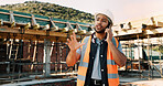 Man, architect or talking with phone call on construction site for building development or planning. Male person, contractor or civil engineer speaking on smartphone for architecture or communication