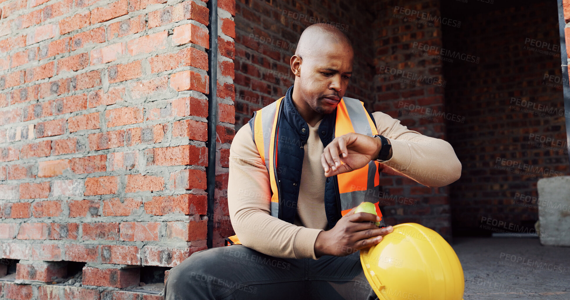 Buy stock photo Watch, black man and civil engineer on site with time management for renovation deadline. Professional, building schedule and African male construction worker with late for property maintenance.