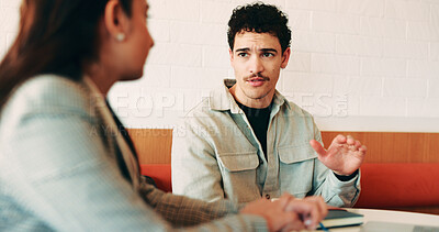 Buy stock photo Man, journalist and interview with woman at cafe for business innovation with questions for article. Person, reporter and entrepreneur with discussion, notebook or insight for story at coffee shop