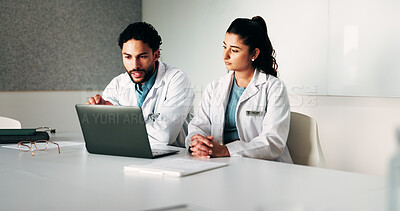 Buy stock photo Doctors, team and laptop with meeting at hospital in boardroom, pointing and planning for healthcare. People, medical professional and insight with computer, feedback or services at wellness clinic