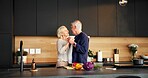 Dancing, happy and senior couple in kitchen for cooking with bonding, connection or marriage. Smile, ingredients and elderly man with woman for groove to music with love on home date together.