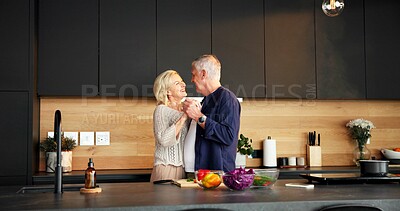 Buy stock photo Dancing, happy and senior couple in kitchen for cooking with bonding, connection or marriage in house. Smile, ingredients and elderly man with woman moving to music with love on home date together.