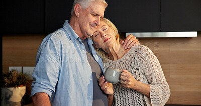 Buy stock photo Old couple, coffee and love in kitchen with hug, beverage and retirement with romance. Bonding together, reflection and elderly man with woman with care, herbal tea or embrace with happiness in home