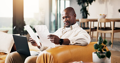 Buy stock photo Documents, laptop and remote work with black man on sofa in home living room for finance review. Computer, paperwork and reading with freelance employee in apartment for financial feedback or report