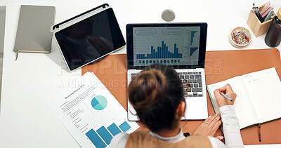 Buy stock photo Business, woman and writing in office with laptop, data analysis and finance report for audit. Above, person and notebook in workplace with pc screen, graph metrics and financial stats of company kpi