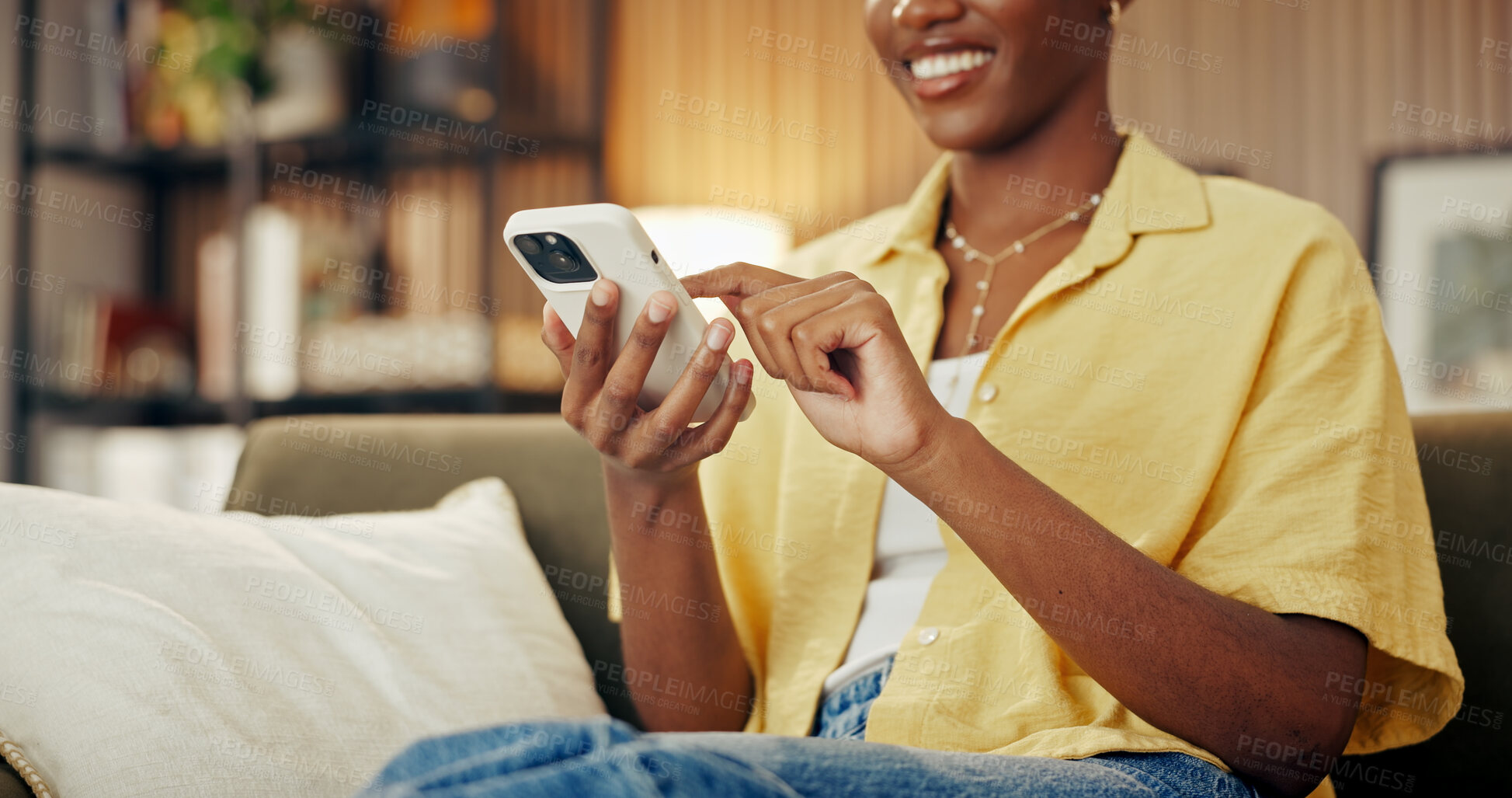 Buy stock photo Digital, texting and hands on couch with phone, online communication and post reaction on social media. Smile, contact and woman in house with technology, message update or chatting on mobile app.